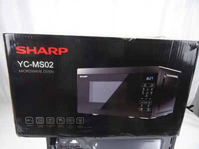 Los 49 - Mikrowelle Sharp YC-MS02E-B